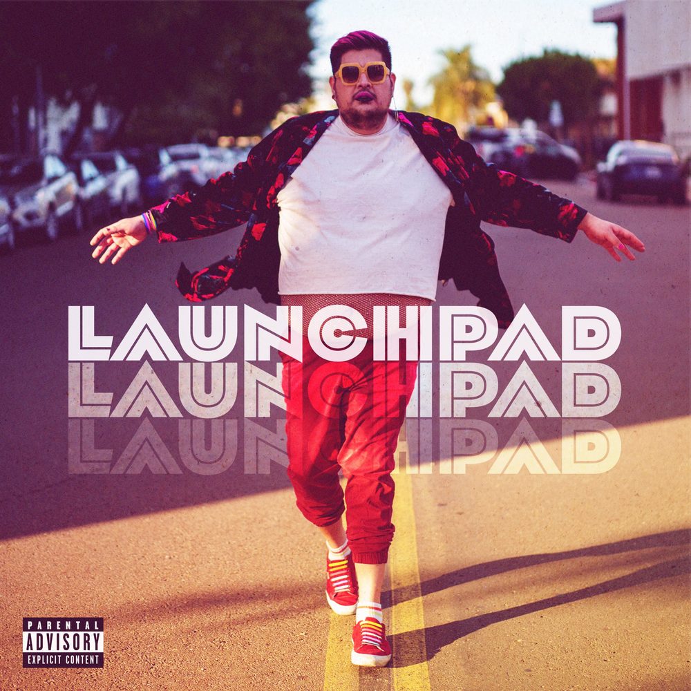 Cover of LAUNCHPAD: Violet Paniko walking down the yellow line of a street in a floral jacket and red pants, repeated title text