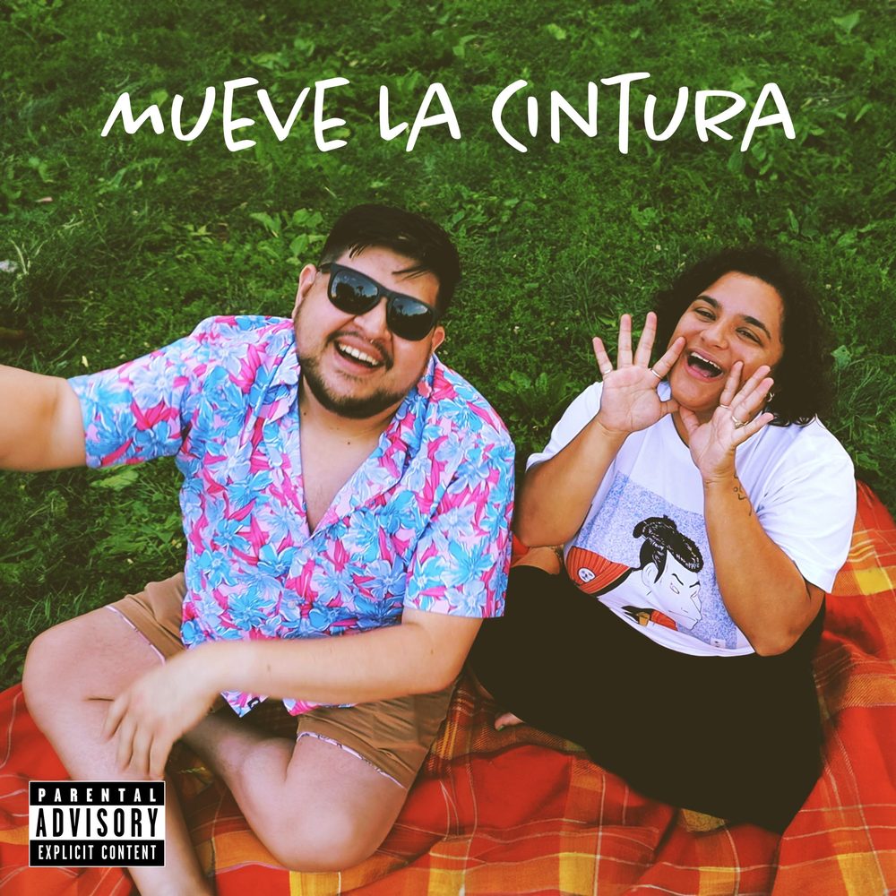 Cover of Mueve La Cintura: Violet Paniko and a friend laughing on a picnic blanket in the grass